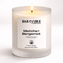 Candle with a label from B&B Candle Company on a white background